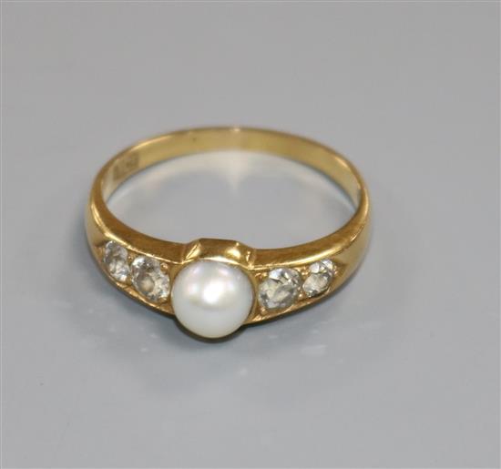 An 18ct gold, single stone cultured pearl and four stone diamond ring, size P/Q.